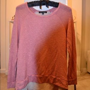 Coral pink sweater with open back and detail